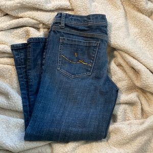 Capris with a few dazzles missing